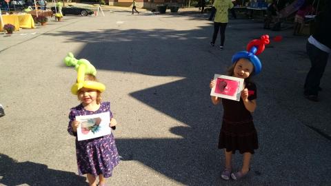 Ava and Lily at a fall festival